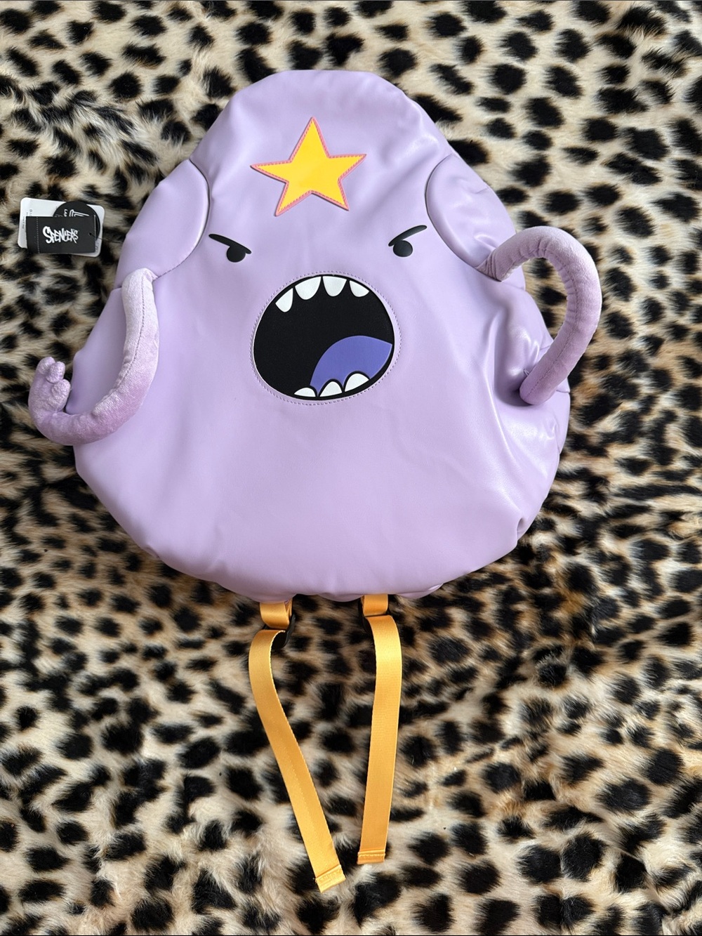 Globe Lavender Star Monster Kids Backpack with Yellow Straps
